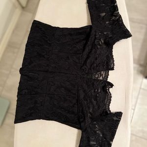 The dress has a lot of detail on it and And it is color black.The size is large.